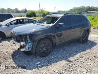 2021 Jeep Cherokee Altitude with VIN 1C4PJLLBXMD144549, listed as a Copart auction lot 62163435 with 94,571 mi miles and Salvage title. Bid and sale history available at DreamBid. Image 1.