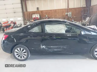 2010 Honda Civic Cpe EX with VIN 2HGFG1B84AH534969, listed as a IAAI auction lot 42067211 with 85,919 mi miles. Bid and sale history available at carsss.com. Image 6.