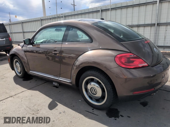 2013 Volkswagen Beetle with VIN 3VWHX7AT8DM603424, listed as a Copart auction lot 51019185 with 136,196 mi miles and Salvage Title. Bid and sale history available at DreamBid. Image 2.