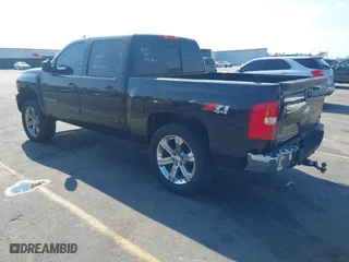 2009 Chevrolet Silverado 1500 LTZ with VIN 3GCEK33389G167139, listed as a IAAI auction lot 41490632 with 221,604 mi miles. Bid and sale history available at carsss.com. Image 3.