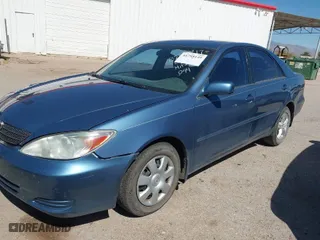 2004 Toyota Camry LE with VIN 4T1BE32K04U907223, listed as a IAAI auction lot 41795149 with 82,411 mi miles. Bid and sale history available at carsss.com. Image 6.