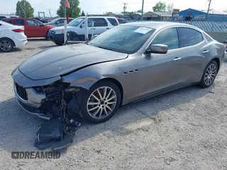 2015 Maserati Ghibli S Q4 z VIN ZAM57RTA2F1154296, wystawiony jako IAAI lot #42263935 z przebiegiem 77 427 mil mil oraz . Historia ofert i sprzedaży dostępna na DreamBid. Obrazek 2.