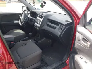 2010 Kia Sportage LX with VIN KNDKGCA39A7709095, listed as a IAAI auction lot 42017606 with 108,774 mi miles and . Bid and sale history available at carsss.com. Image 5.
