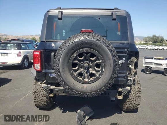 2023 Ford Bronco with VIN 1FMDE5CH2PLA96705, listed as a Copart auction lot 60813415 with 14,760 mi miles and Salvage title. Bid and sale history available at DreamBid. Image 6.