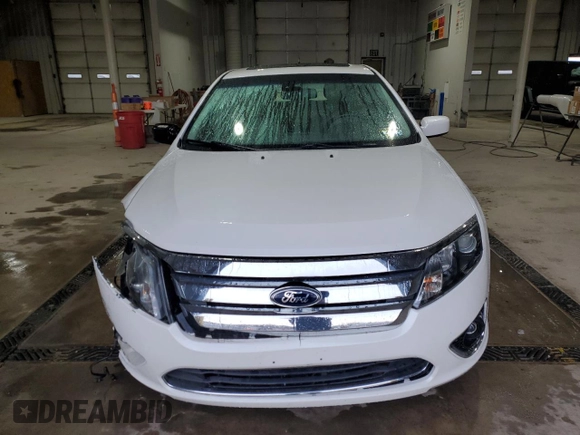 2012 Ford Fusion SEL with VIN 3FAHP0JA9CR167134, listed as a Copart auction lot 50869835 with 128,956 mi miles and Salvage Title. Bid and sale history available at DreamBid. Image 5.