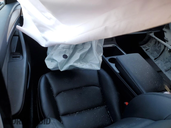 2024 Tesla Model Y Long Range with VIN 7SAYGDEE6RF063230, listed as a Copart auction lot 42872535 with Not Provided miles and Salvage Title. Bid and sale history available at DreamBid. Image 8.