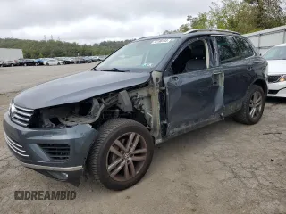 2015 Volkswagen Touareg Sport with VIN WVGEF9BP8FD007326, listed as a Copart auction lot 72196144 with 110,802 mi miles and Salvage title. Bid and sale history available at DreamBid. Image 1.
