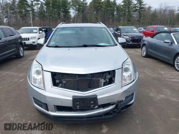 2014 Cadillac SRX Luxury Collection z VIN 3GYFNEE33ES670356, wystawiony jako IAAI lot #42008087 z przebiegiem 59 953 mil mil oraz . Historia ofert i sprzedaży dostępna na DreamBid. Obrazek 13.