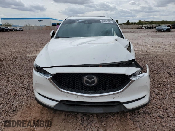 2019 Mazda CX-5 Signature with VIN JM3KFBEY3K0594305, listed as a Copart auction lot 49009235 with 73,993 mi miles and Salvage Title. Bid and sale history available at carsss.com. Image 5.