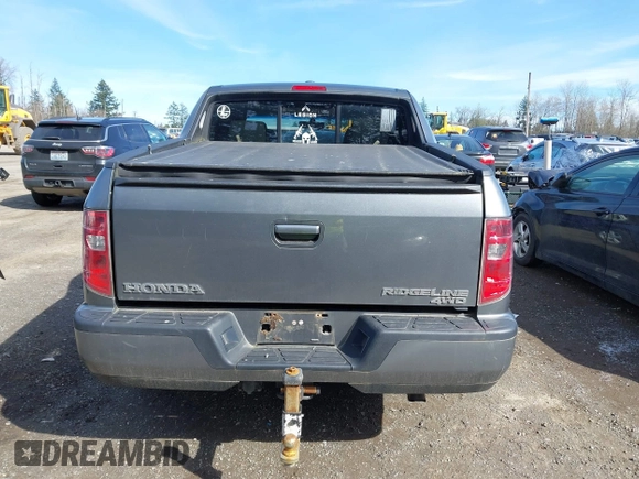 2009 Honda Ridgeline RTL with VIN 5FPYK16599B100707, listed as a IAAI auction lot 41877598 with 130,622 mi miles and . Bid and sale history available at DreamBid. Image 16.