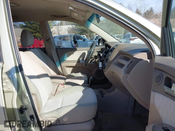 2005 Kia Sportage LX with VIN KNDJE723757081826, listed as a IAAI auction lot 41775450 with 106,992 mi miles and . Bid and sale history available at carsss.com. Image 5.