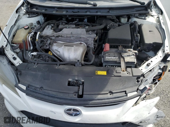 2014 Scion tC z VIN JTKJF5C70E3084697, wystawiony jako Copart lot #54307295 z przebiegiem 174 073 mil mil oraz Szkoda całkowita • Salvage title. Historia ofert i sprzedaży dostępna na DreamBid. Obrazek 11.