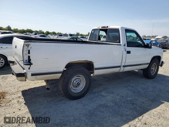 1999 GMC Sierra 1500 z VIN 1GTGC24RXXR721667, wystawiony jako Copart lot #58575985 z przebiegiem 201 752 mil mil oraz Czysty tytuł • Clean title. Historia ofert i sprzedaży dostępna na DreamBid. Obrazek 3.