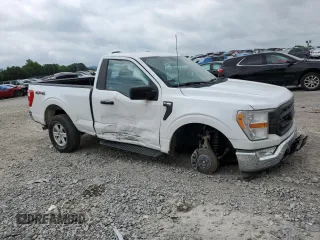 2021 Ford F-150 XL with VIN 1FTMF1EP7MKE72931, listed as a Copart auction lot 60650605 with 23,825 mi miles and Salvage title. Bid and sale history available at DreamBid. Image 4.