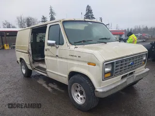 1990 Ford Econoline Cargo with VIN 1FTDE14N0LHA80405, listed as a IAAI auction lot 41824747 with 91,278 mi miles and . Bid and sale history available at DreamBid. Image 1.