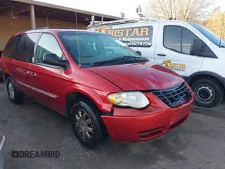2006 Chrysler Town & Country LWB Touring with VIN 2A8GP54L66R655864, listed as a IAAI auction lot 41454605 with 211,445 mi miles. Bid and sale history available at carsss.com. Image 1.