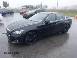 2015 Infiniti Q50 Premium z VIN JN1BV7ARXFM412382, wystawiony jako IAAI lot #40776813 z przebiegiem 66 406 mil mil oraz . Historia ofert i sprzedaży dostępna na DreamBid. Obrazek 17.