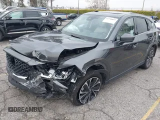 2022 Mazda CX-5 2.5 S Premium Plus Package with VIN JM3KFBEM1N0523105, listed as a IAAI auction lot 41730897 with 64,008 mi miles. Bid and sale history available at carsss.com. Image 18.