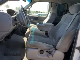 2002 Ford F-150 XL with VIN 1FTRX17212NA28461, listed as a Copart auction lot 63710665 with 185,460 mi miles and Salvage title. Bid and sale history available at DreamBid. Image 7.