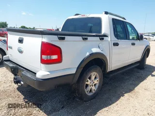 2007 Ford Explorer Sport Trac XLT z VIN 1FMEU31K17UA04200, wystawiony jako IAAI lot #42733514 z przebiegiem 180 899 mil mil oraz . Historia ofert i sprzedaży dostępna na DreamBid. Obrazek 4.