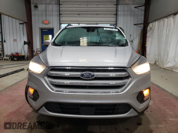 2018 Ford Escape SE with VIN 1FMCU9GD7JUA25403, listed as a Copart auction lot 87158814 with 121,281 mi miles and Salvage Title. Bid and sale history available at carsss.com. Image 5.