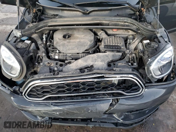 2018 MINI Countryman Cooper S z VIN WMZYT5C30J3E62171, wystawiony jako Copart lot #88342605 z przebiegiem 69 189 mil mil oraz Szkoda całkowita • Salvage title. Historia ofert i sprzedaży dostępna na DreamBid. Obrazek 11.