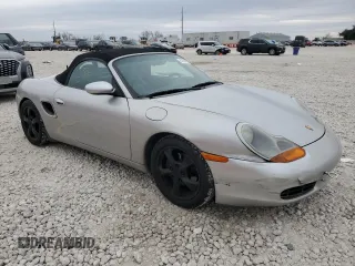 2001 Porsche Boxster с VIN WP0CA29821U621779, выставлен на аукционе Copart как лот 87204984 с пробегом 82 091 миль миль и Списание • Salvage title. История ставок и продаж доступна на DreamBid. Изображение 4.