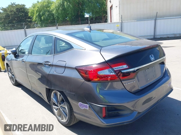2018 Honda Clarity Touring z VIN JHMZC5F33JC021811, wystawiony jako IAAI lot #42272808 z przebiegiem 82 414 mil mil oraz . Historia ofert i sprzedaży dostępna na DreamBid. Obrazek 14.