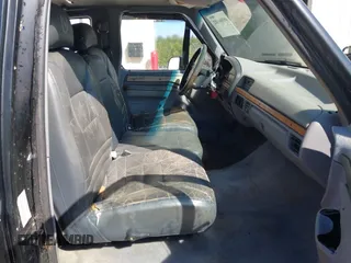 1995 Ford F-150 z VIN 1FTEX15N8SKB58783, wystawiony jako IAAI lot #40366102 z przebiegiem 148 639 mil mil oraz . Historia ofert i sprzedaży dostępna na DreamBid. Obrazek 5.