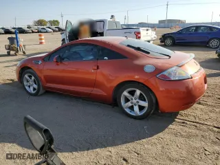 2008 Mitsubishi Eclipse GS with VIN 4A3AK24F28E025843, listed as a Copart auction lot 74224814 with 76,945 mi miles and Salvage Title. Bid and sale history available at carsss.com. Image 2.
