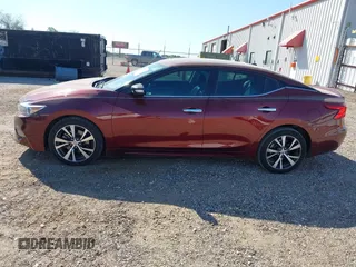 2016 Nissan Maxima Platinum z VIN 1N4AA6AP1GC416590, wystawiony jako IAAI lot #41817288 z przebiegiem 248 514 mil mil oraz . Historia ofert i sprzedaży dostępna na DreamBid. Obrazek 15.