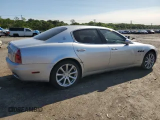 2005 Maserati Quattroporte z VIN ZAMCE39AX50019962, wystawiony jako Copart lot #59158555 z przebiegiem 24 013 mil mil oraz Czysty tytuł • Clean title. Historia ofert i sprzedaży dostępna na DreamBid. Obrazek 4.