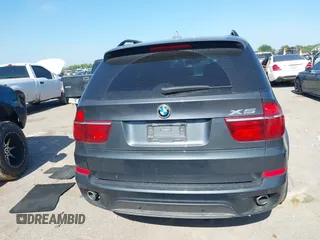 2012 BMW X5 35d with VIN 5UXZW0C51CL669957, listed as a IAAI auction lot 42230292 with 102,305 mi miles and . Bid and sale history available at DreamBid. Image 16.