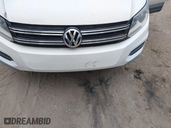 2012 Volkswagen Tiguan with VIN WVGCV7AX5CW508206, listed as a IAAI auction lot 41612007 with 116,455 mi miles and . Bid and sale history available at DreamBid. Image 6.