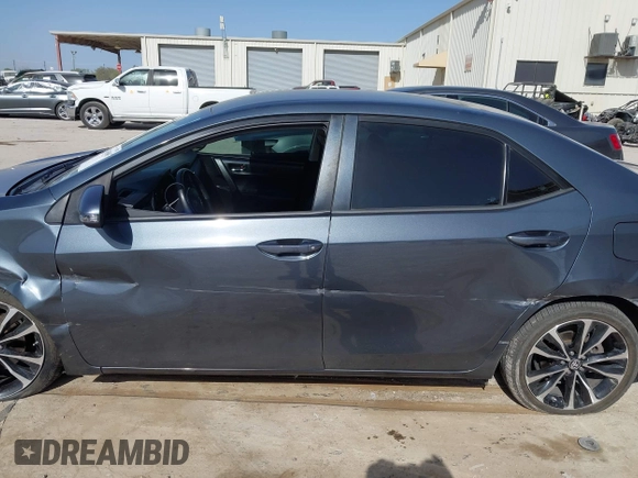 2019 Toyota Corolla L with VIN 5YFBURHE9KP910059, listed as a IAAI auction lot 41856905 with 104,096 mi miles and . Bid and sale history available at DreamBid. Image 14.