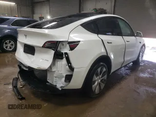 2023 Tesla Model Y Long Range with VIN 7SAYGDEE6PF806434, listed as a Copart auction lot 51455035 with Not Provided miles and Salvage Title. Bid and sale history available at DreamBid. Image 3.