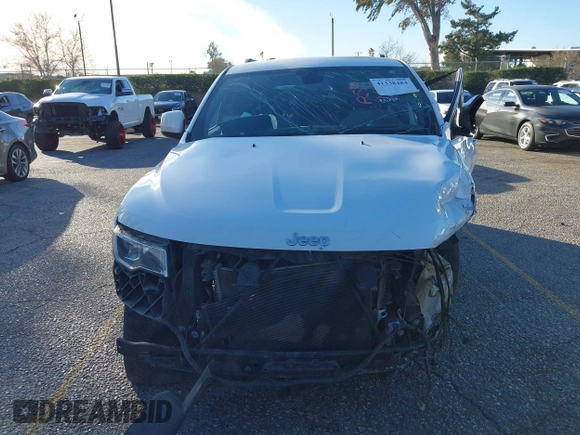 2021 Jeep Grand Cherokee Laredo X with VIN 1C4RJEAG2MC719395, listed as a IAAI auction lot 41338484 with 99,636 mi miles and . Bid and sale history available at DreamBid. Image 12.