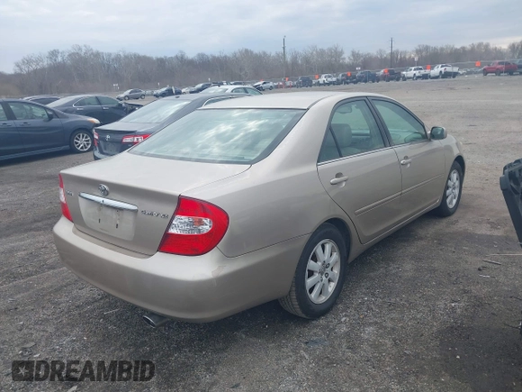 2003 Toyota Camry LE with VIN 4T1BE30K73U248560, listed as a IAAI auction lot 41889516 with 179,961 mi miles and . Bid and sale history available at DreamBid. Image 4.