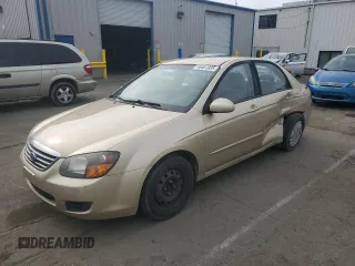 2009 Kia Spectra LX with VIN KNAFE221095647556, listed as a Copart auction lot 46481835 with 265,260 mi miles and Salvage Title. Bid and sale history available at carsss.com. Image 1.