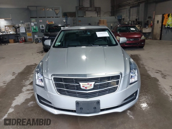 2016 Cadillac ATS Standard AWD z VIN 1G6AG5RX6G0149829, wystawiony jako IAAI lot #42165534 z przebiegiem 40 996 mil mil oraz . Historia ofert i sprzedaży dostępna na DreamBid. Obrazek 12.