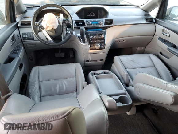 2012 Honda Odyssey Touring with VIN 5FNRL5H9XCB027758, listed as a Copart auction lot 86058504 with 164,860 mi miles and Salvage Title. Bid and sale history available at DreamBid. Image 8.