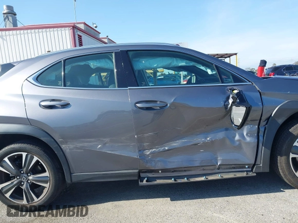 2019 Lexus UX with VIN JTHY3JBH6K2002909, listed as a IAAI auction lot 41980292 with 28,964 mi miles. Bid and sale history available at carsss.com. Image 13.