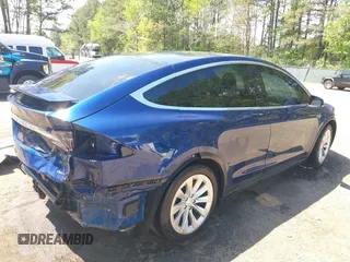 2016 Tesla Model X 70D z VIN 5YJXCBE20GF006744, wystawiony jako IAAI lot #42045005 z przebiegiem 169 619 mil mil oraz . Historia ofert i sprzedaży dostępna na DreamBid. Obrazek 4.