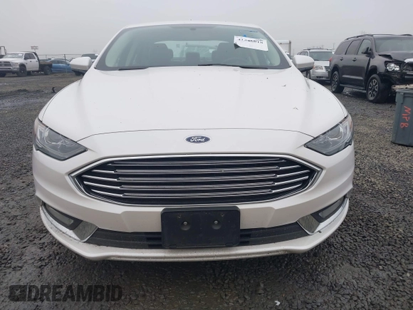 2017 Ford Fusion SE z VIN 3FA6P0H71HR201799, wystawiony jako IAAI lot #41346018 z przebiegiem 51 126 mil mil oraz . Historia ofert i sprzedaży dostępna na DreamBid. Obrazek 6.