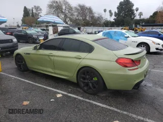 2013 BMW 6 Series 650i with VIN WBA6B2C59DDG66909, listed as a Copart auction lot 86329014 with 131,054 mi miles and Salvage Title. Bid and sale history available at DreamBid. Image 2.