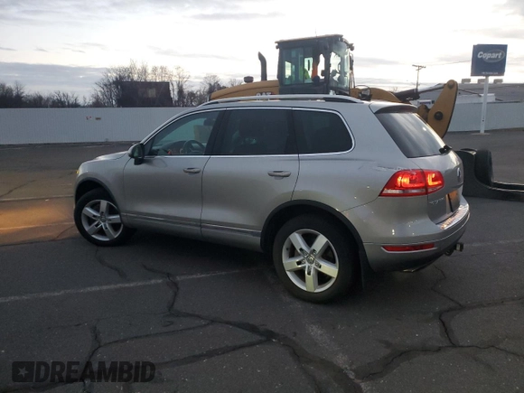 2012 Volkswagen Touareg with VIN WVGFG9BPXCD004442, listed as a Copart auction lot 41466935 with 98,956 mi miles and Clean title. Bid and sale history available at DreamBid. Image 2.