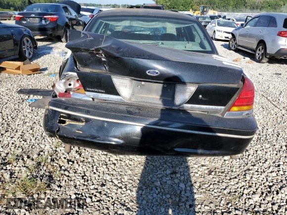 2002 Ford Crown Victoria Police z VIN 2FAFP71W52X157857, wystawiony jako Copart lot #65963304 z przebiegiem 203 427 mil mil oraz Tytuł czysty. Historia ofert i sprzedaży dostępna na DreamBid. Obrazek 6.