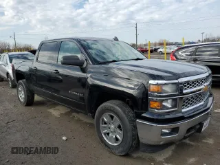 2015 Chevrolet Silverado 1500 LT with VIN 3GCUKREH5FG338299, listed as a Copart auction lot 50683905 with 184,974 mi miles and Salvage Title. Bid and sale history available at DreamBid. Image 4.