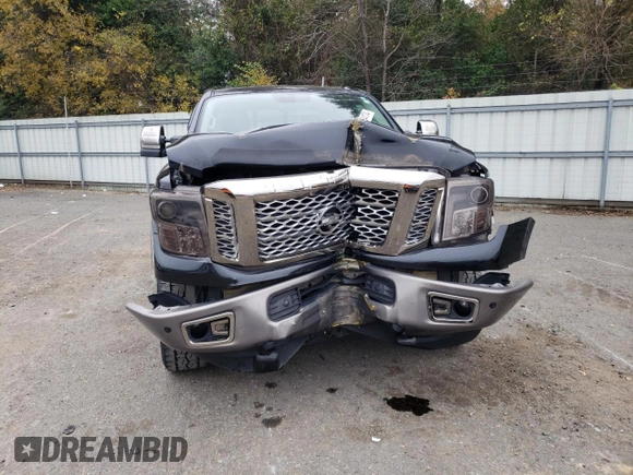 2017 Nissan Titan XD SL with VIN 1N6AA1F41HN548361, listed as a Copart auction lot 84654174 with 142,057 mi miles and Salvage Title. Bid and sale history available at carsss.com. Image 5.