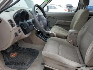 2003 Nissan Frontier XE with VIN 1N6DD26T03C423079, listed as a Copart auction lot 44593295 with 232,850 mi miles and Salvage title. Bid and sale history available at DreamBid. Image 7.